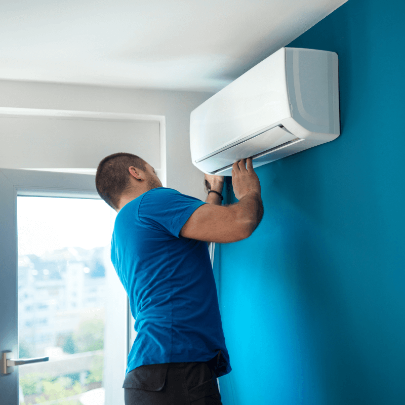 Person Repairing AC